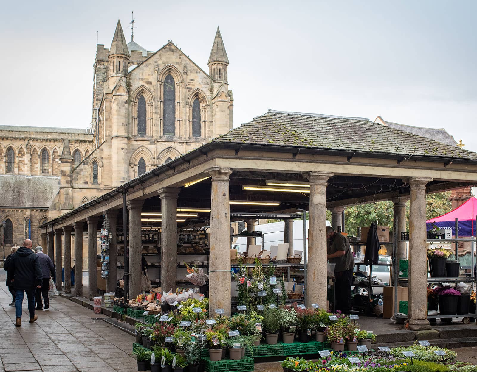 Hexham market day pic with Abbey in background